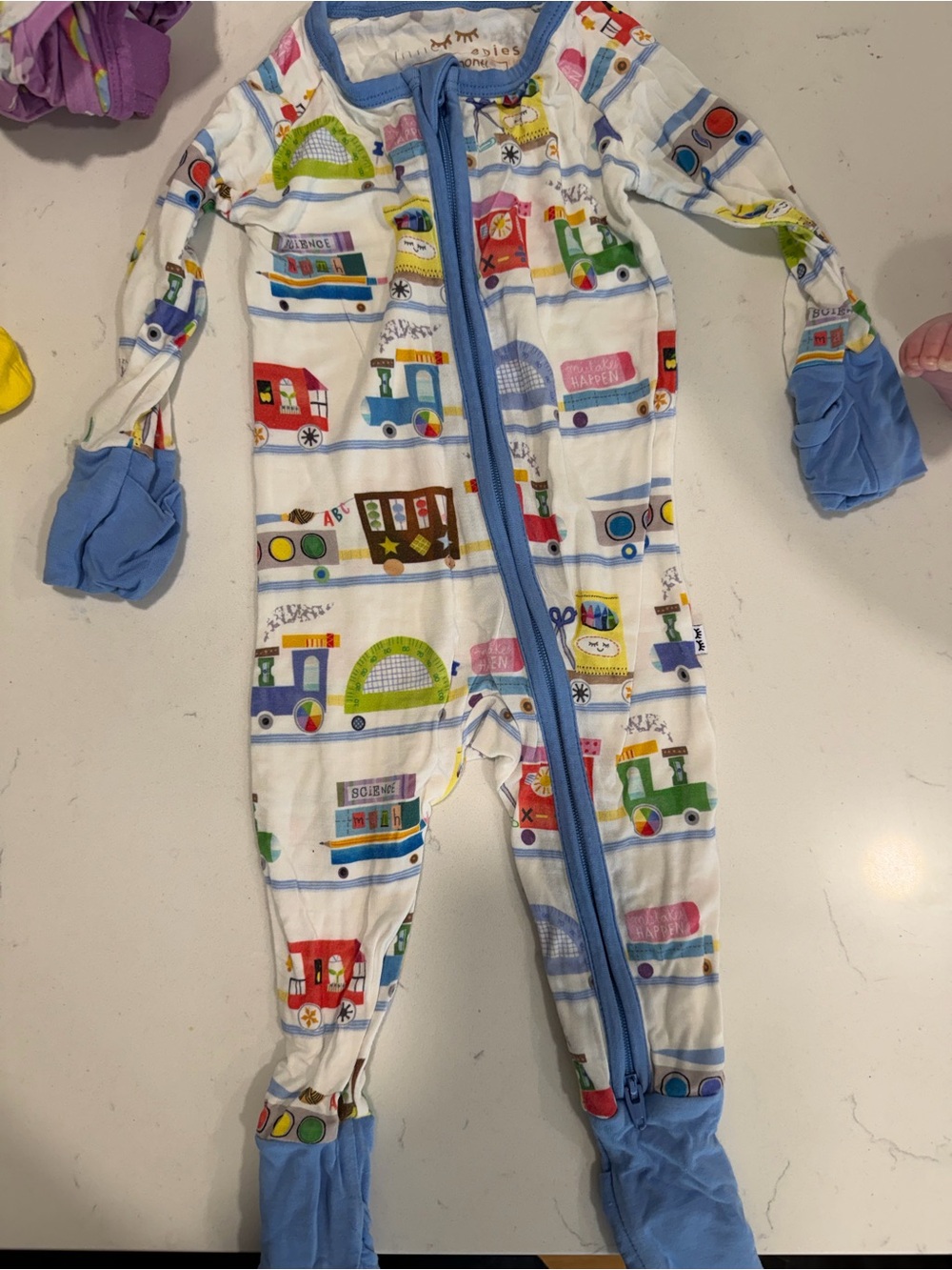 Little Sleepies White Footed One-Piece with Blue Trim and Colorful Train Print